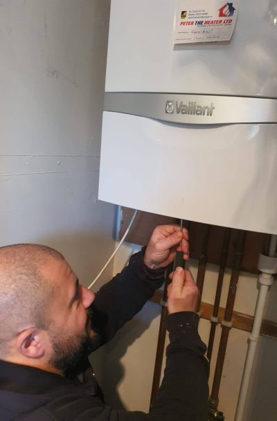 Expert technician performing a gas boiler replacement in Abingdon, Oxford, ensuring efficient and safe installation for your home